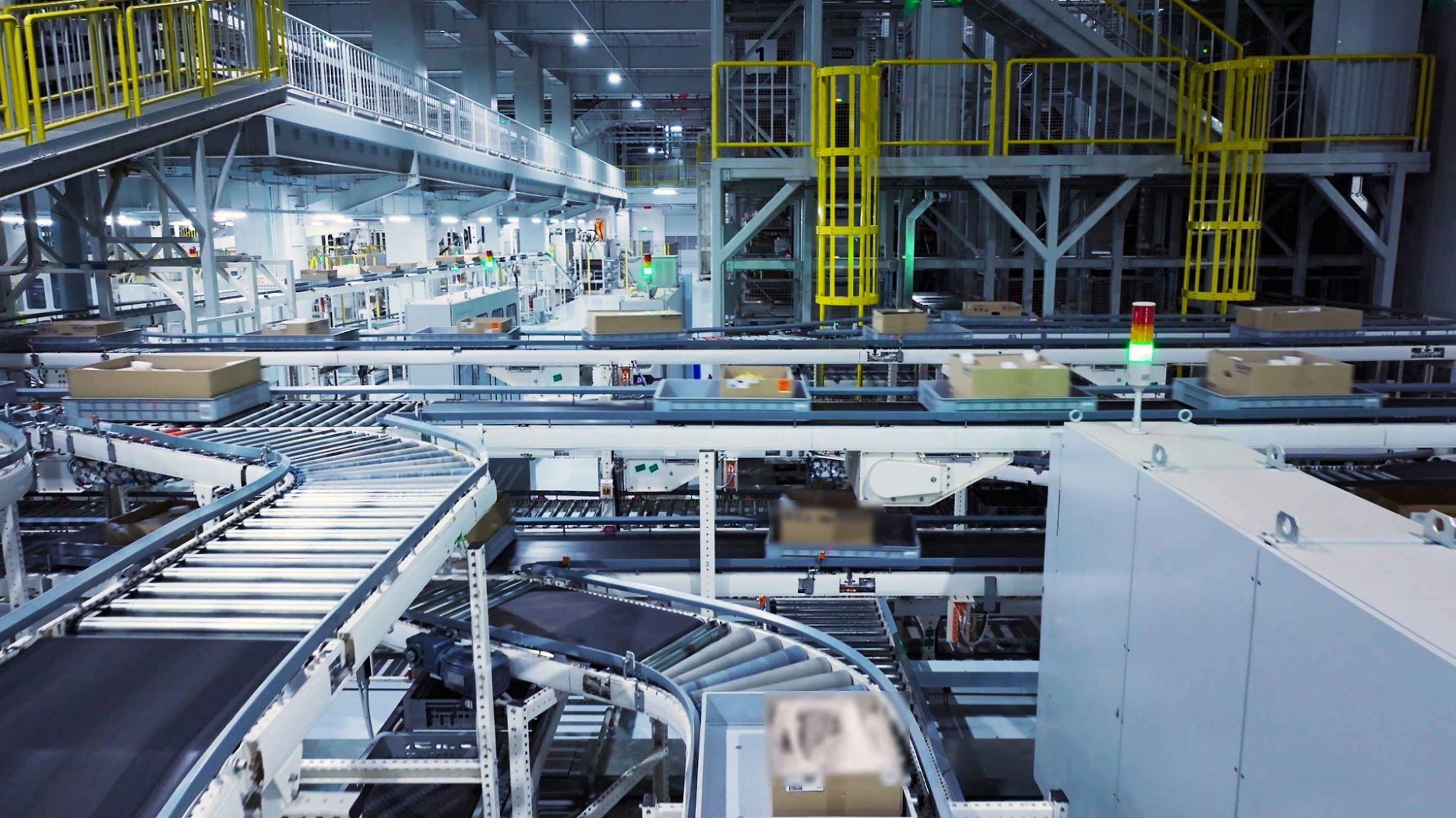 Automated logistics warehouse with conveyor sortation lines moving cartons